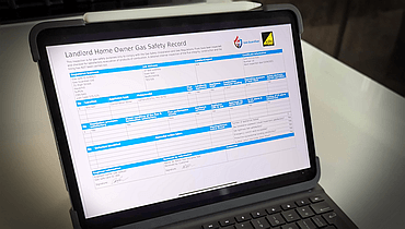 Digital gas safety record displayed on a tablet